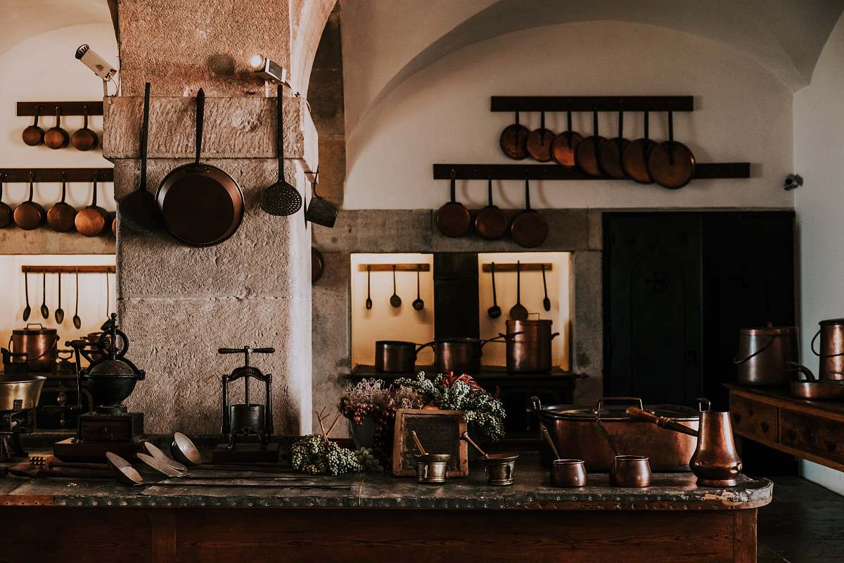interior design kitchen filled with cooking pans and kitchen utensils indoors
